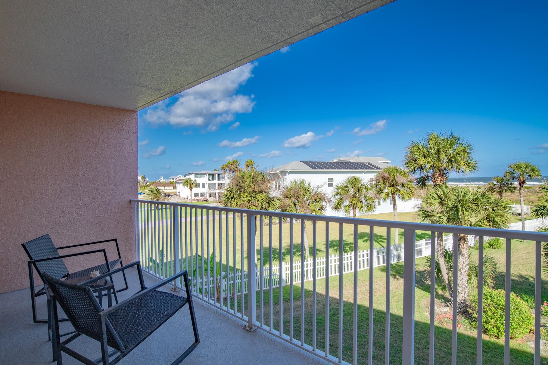 4 Ocean Trace Road, Unit 323 St. Augustine Beach, FL 32080 - Photo 13 of 37 a view of a balcony with furniture