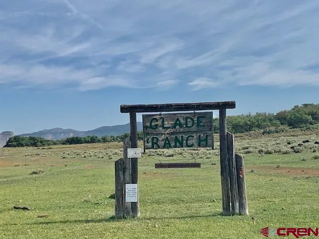 a view of a lake with a big yard