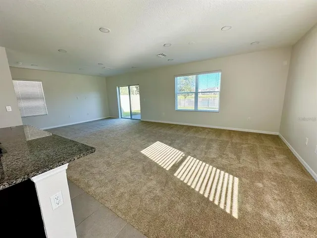 a view of a kitchen with a sink