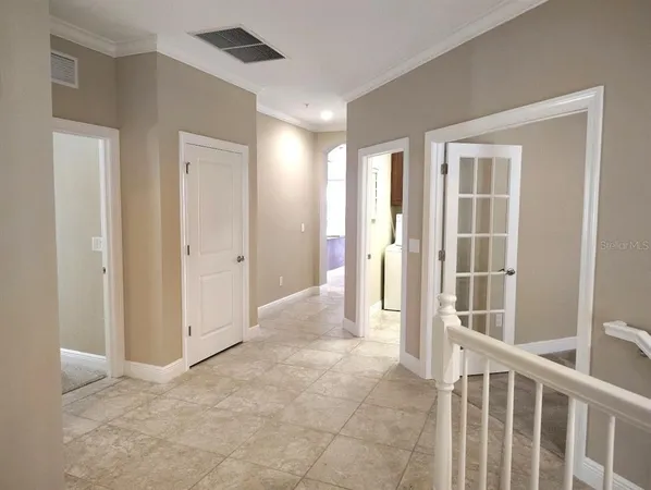 an aerial view of a city and lake view