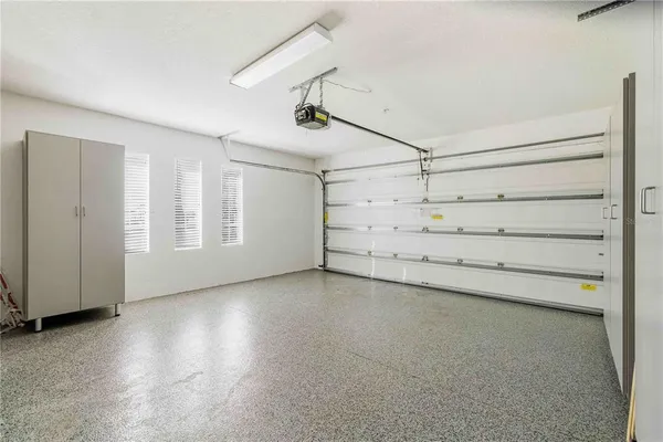 an aerial view of a houses with ocean view