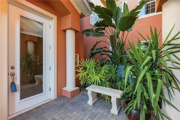 a view of a patio with swimming pool table and chairs