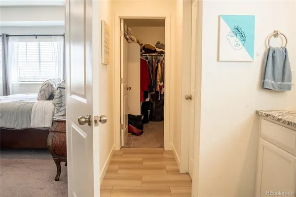 a view of a bedroom from a hallway