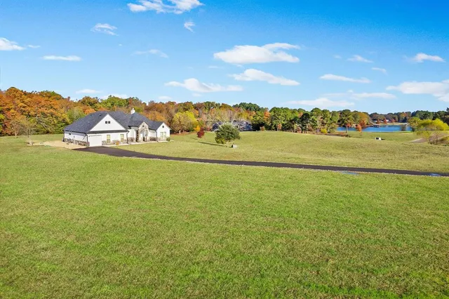a view of an ocean and a mountain