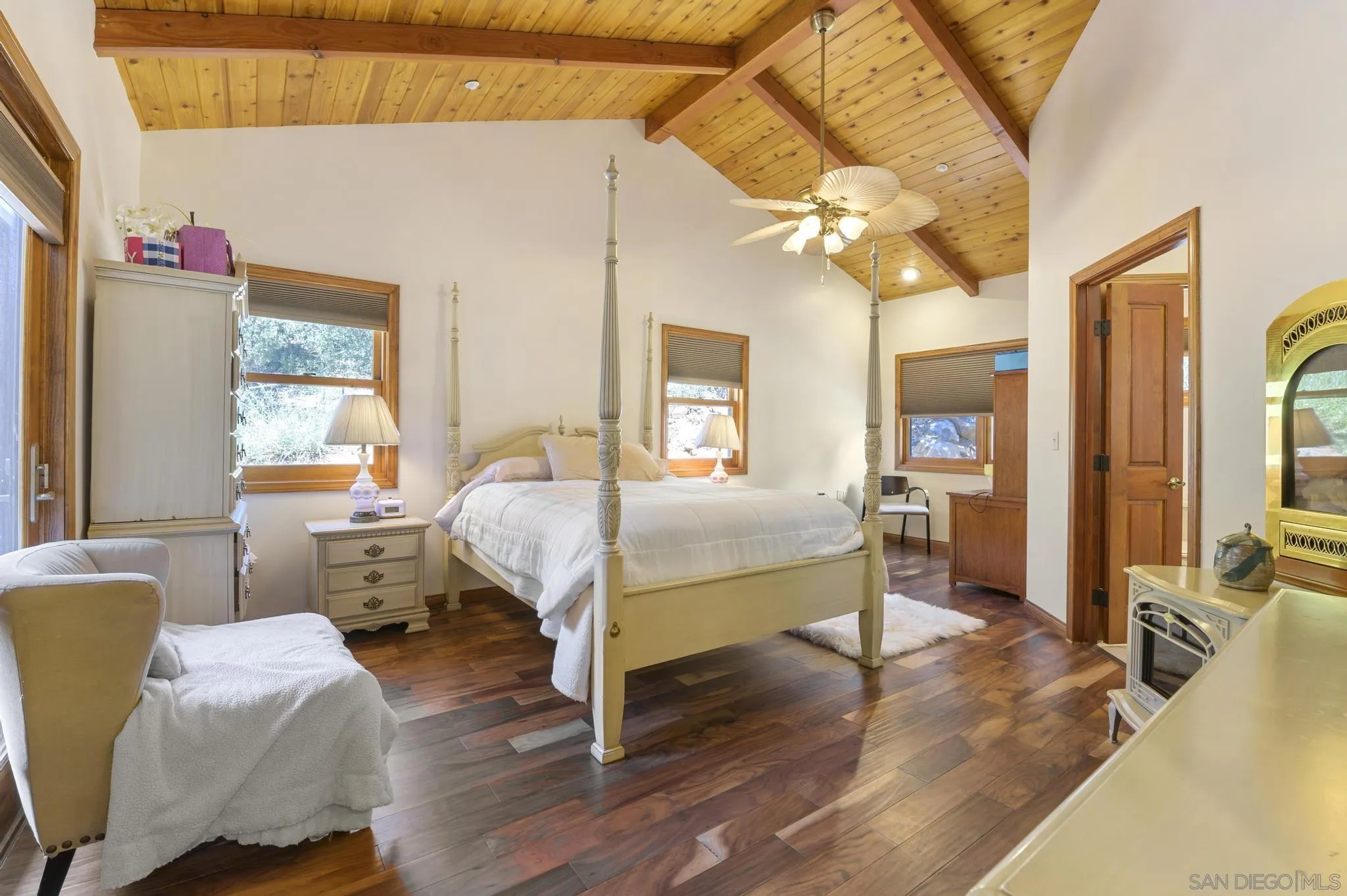 34610 Apache Drive Julian, CA 92036 - Photo 11 of 23 a bedroom with furniture and a chandelier