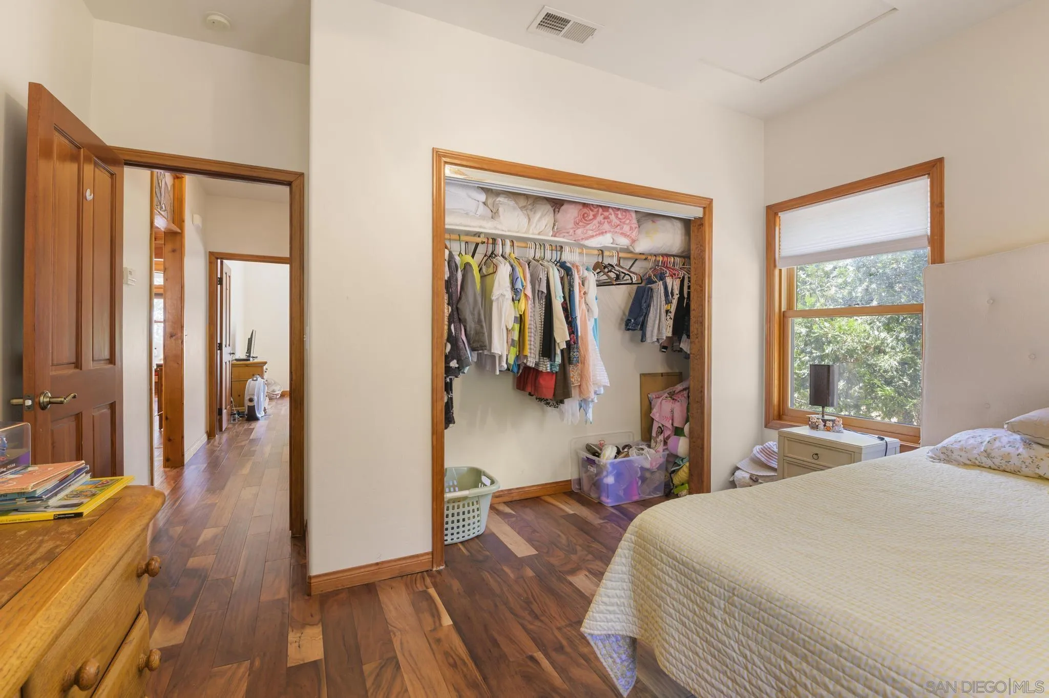 34610 Apache Drive Julian, CA 92036 - Photo 16 of 23 a bedroom with a bed and a large mirror