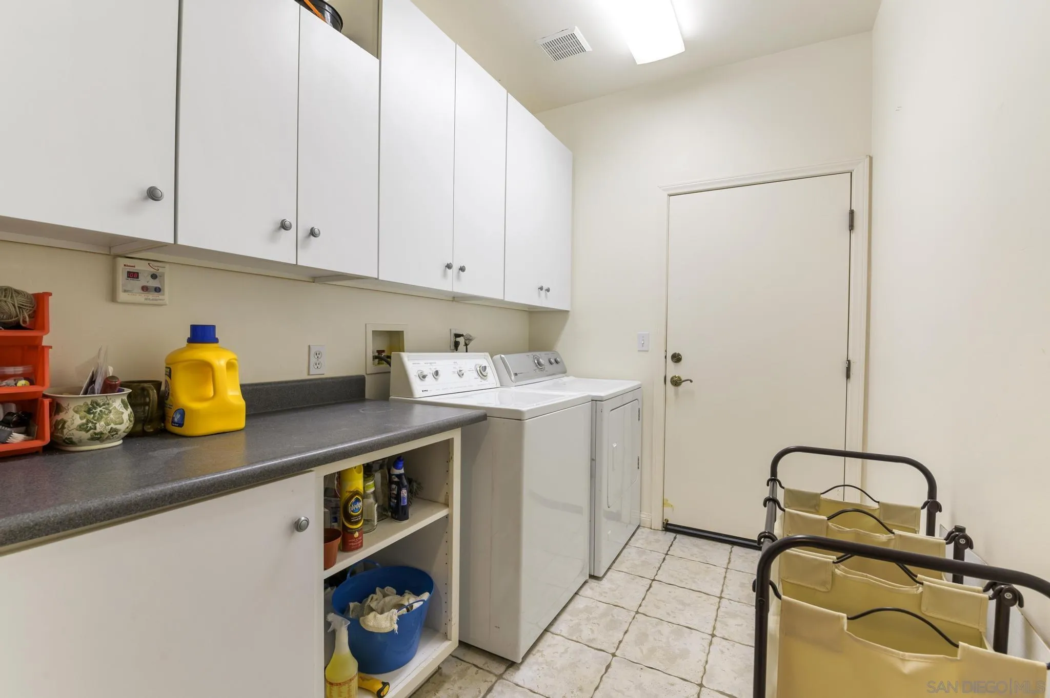 34610 Apache Drive Julian, CA 92036 - Photo 18 of 23 a kitchen with a sink cabinets and appliances
