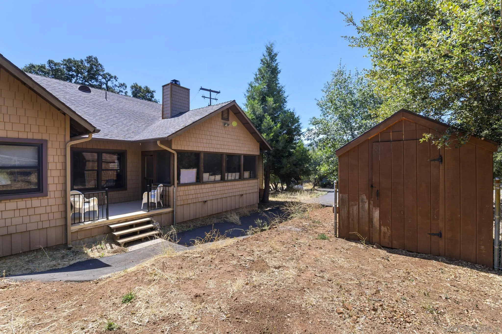 34610 Apache Drive Julian, CA 92036 - Photo 20 of 23 a view of a house with a yard