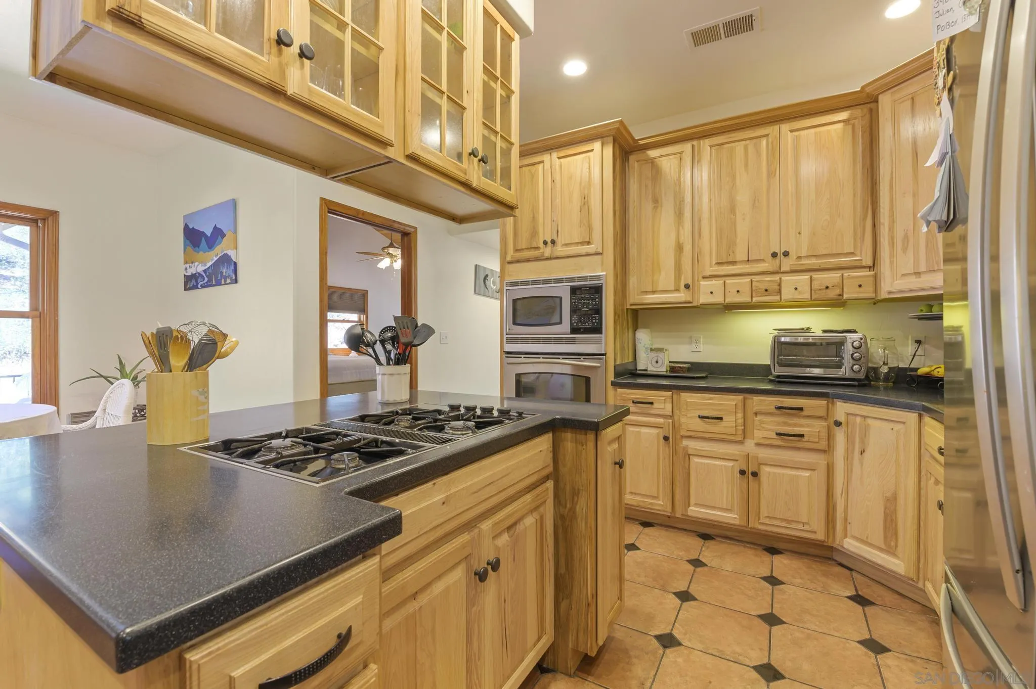 34610 Apache Drive Julian, CA 92036 - Photo 7 of 23 a kitchen with stainless steel appliances granite countertop a stove a sink and a refrigerator