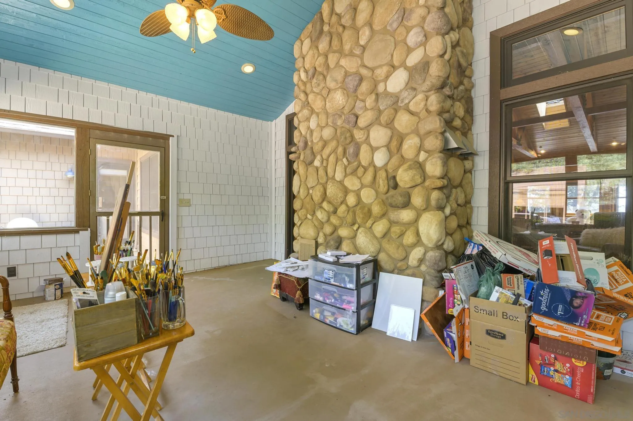 34610 Apache Drive Julian, CA 92036 - Photo 10 of 23 a living room with furniture and a chandelier