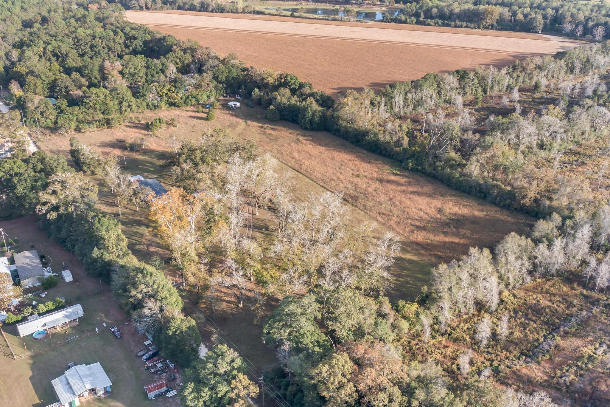 960 State Line Road DeFuniak Springs, FL 32433 - Photo 47 of 51 a view of a yard with an outdoor space