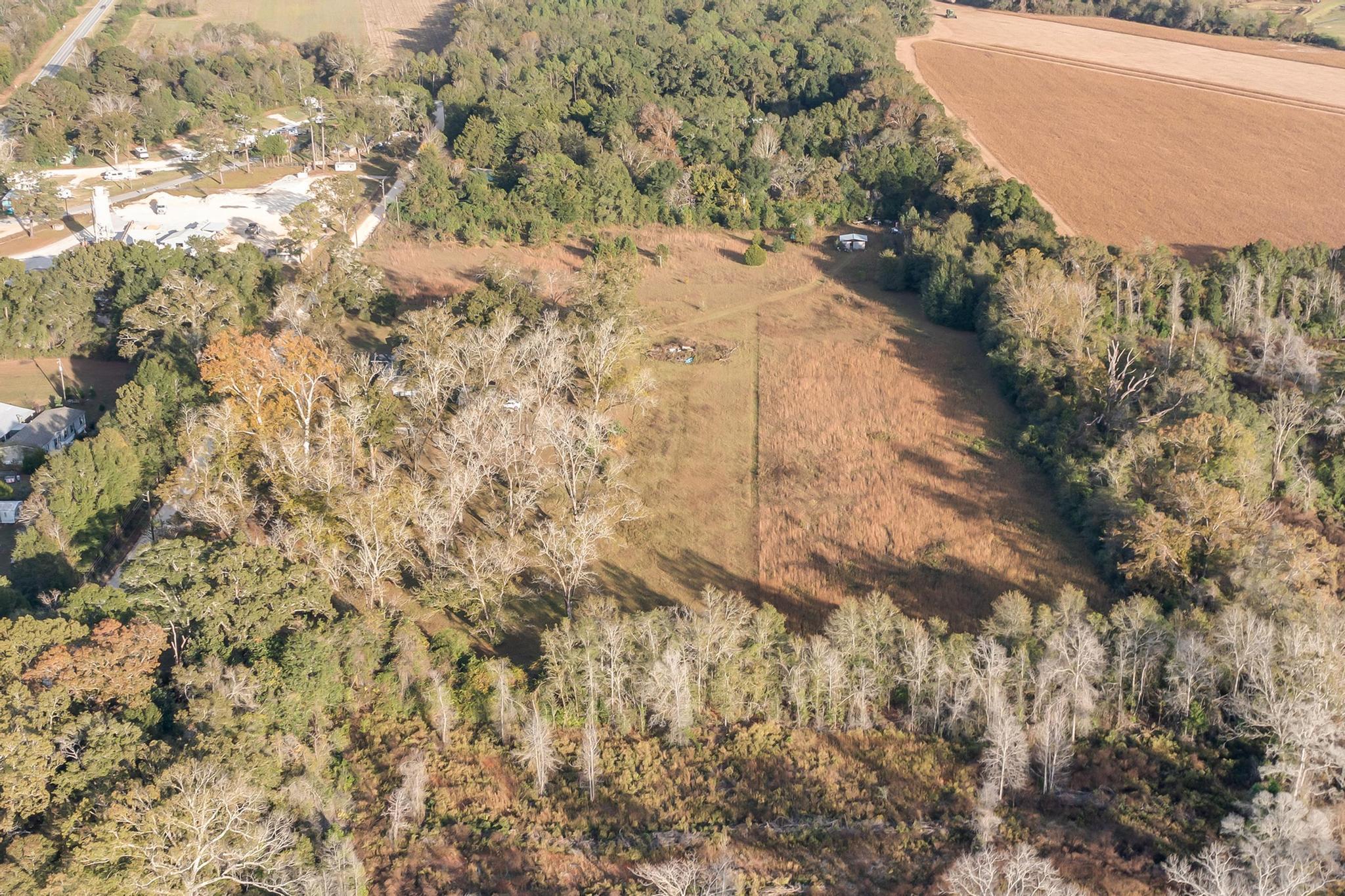 960 State Line Road DeFuniak Springs, FL 32433 - Photo 48 of 51 a view of a yard with an trees