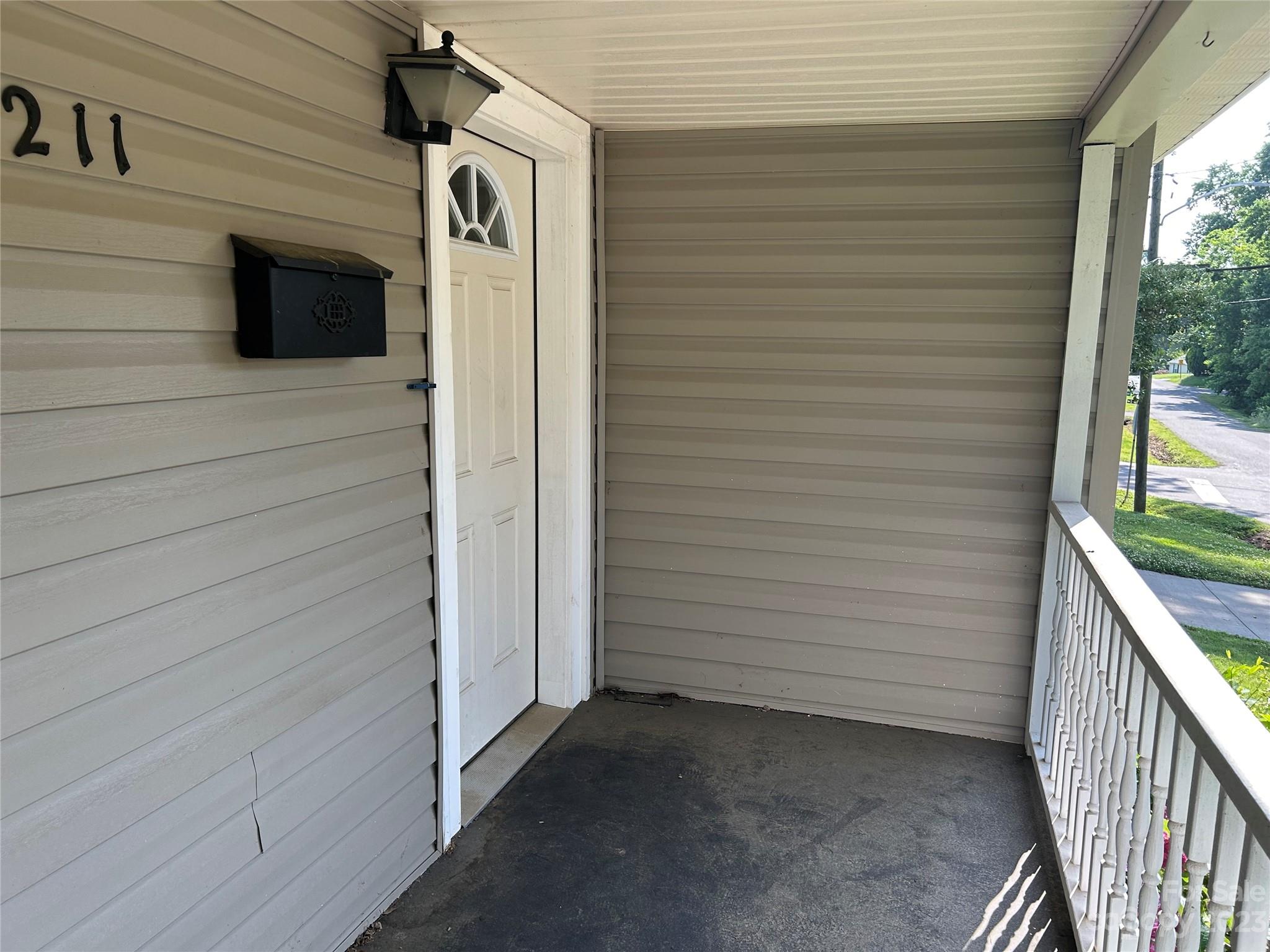 211 Calhoun Street Fort Mill, SC 29715 - Photo 4 of 13 a view of front door and porch