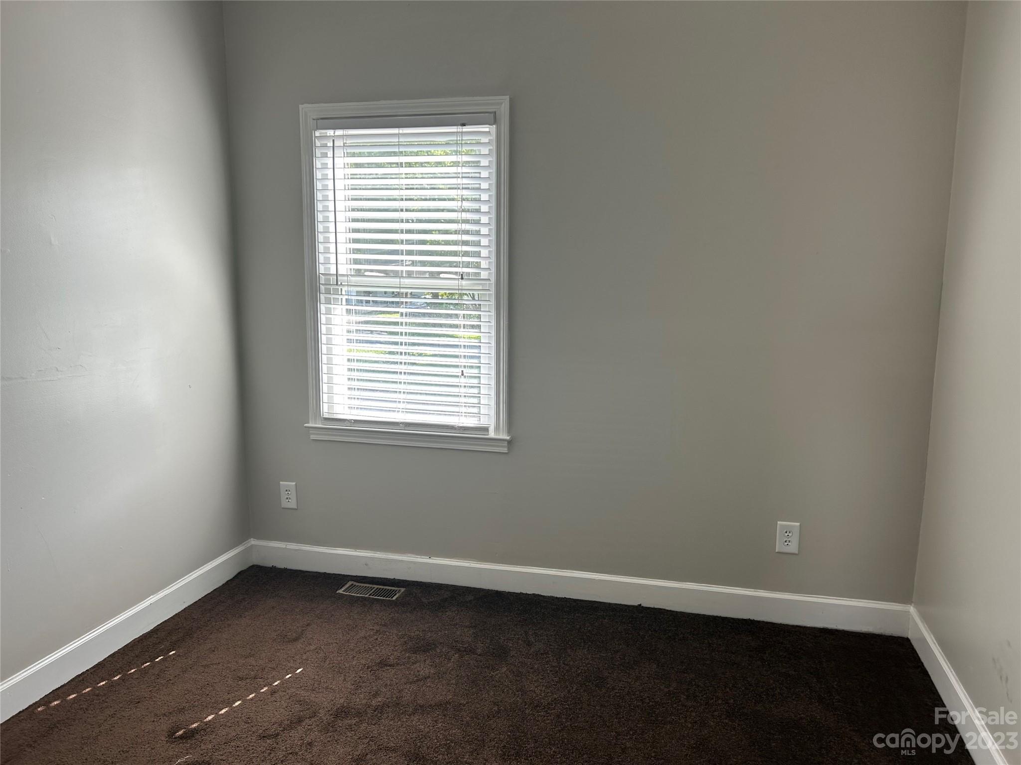 211 Calhoun Street Fort Mill, SC 29715 - Photo 7 of 13 an empty room with a window