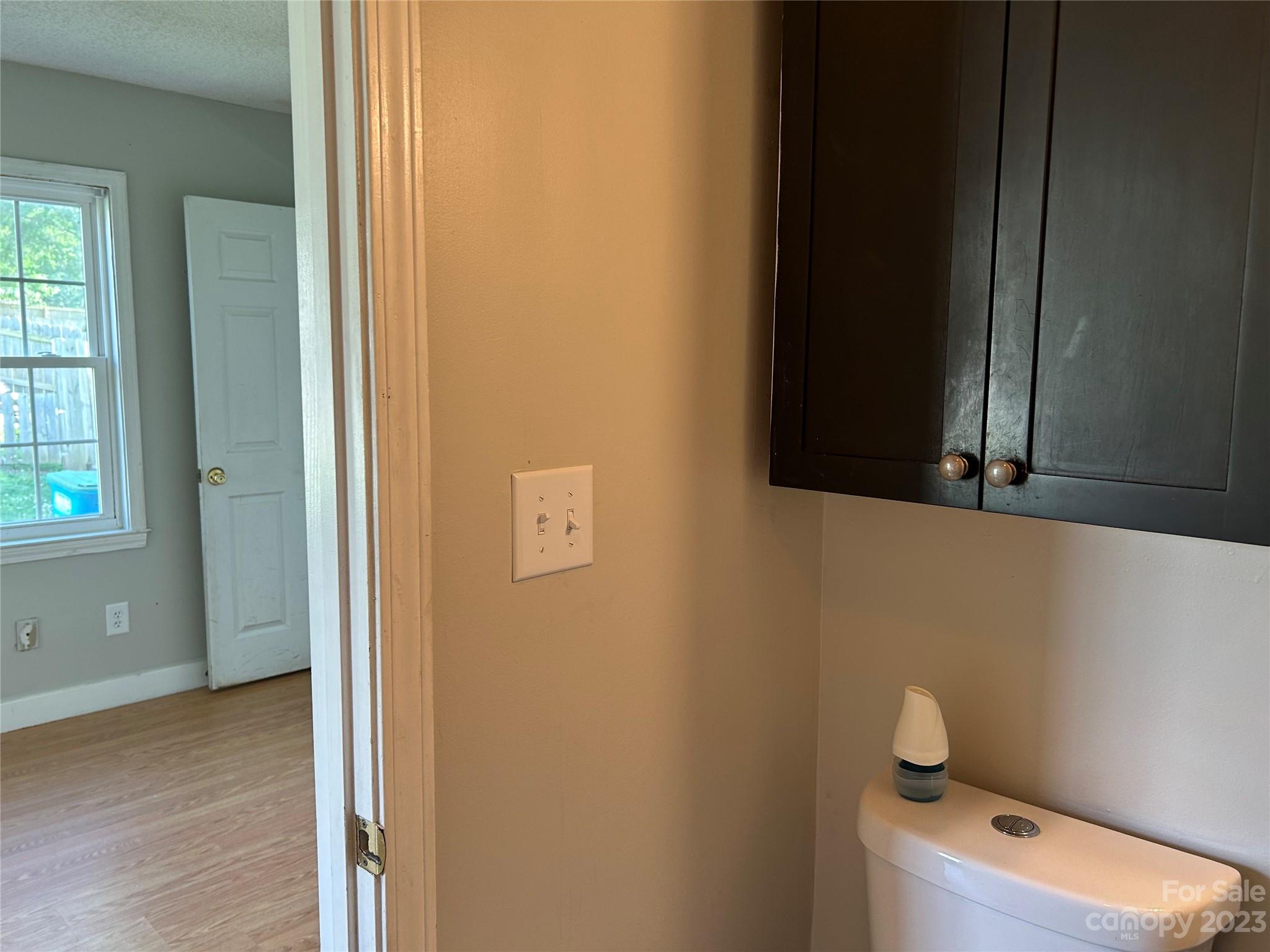 211 Calhoun Street Fort Mill, SC 29715 - Photo 10 of 13 a bathroom with a toilet and a sink