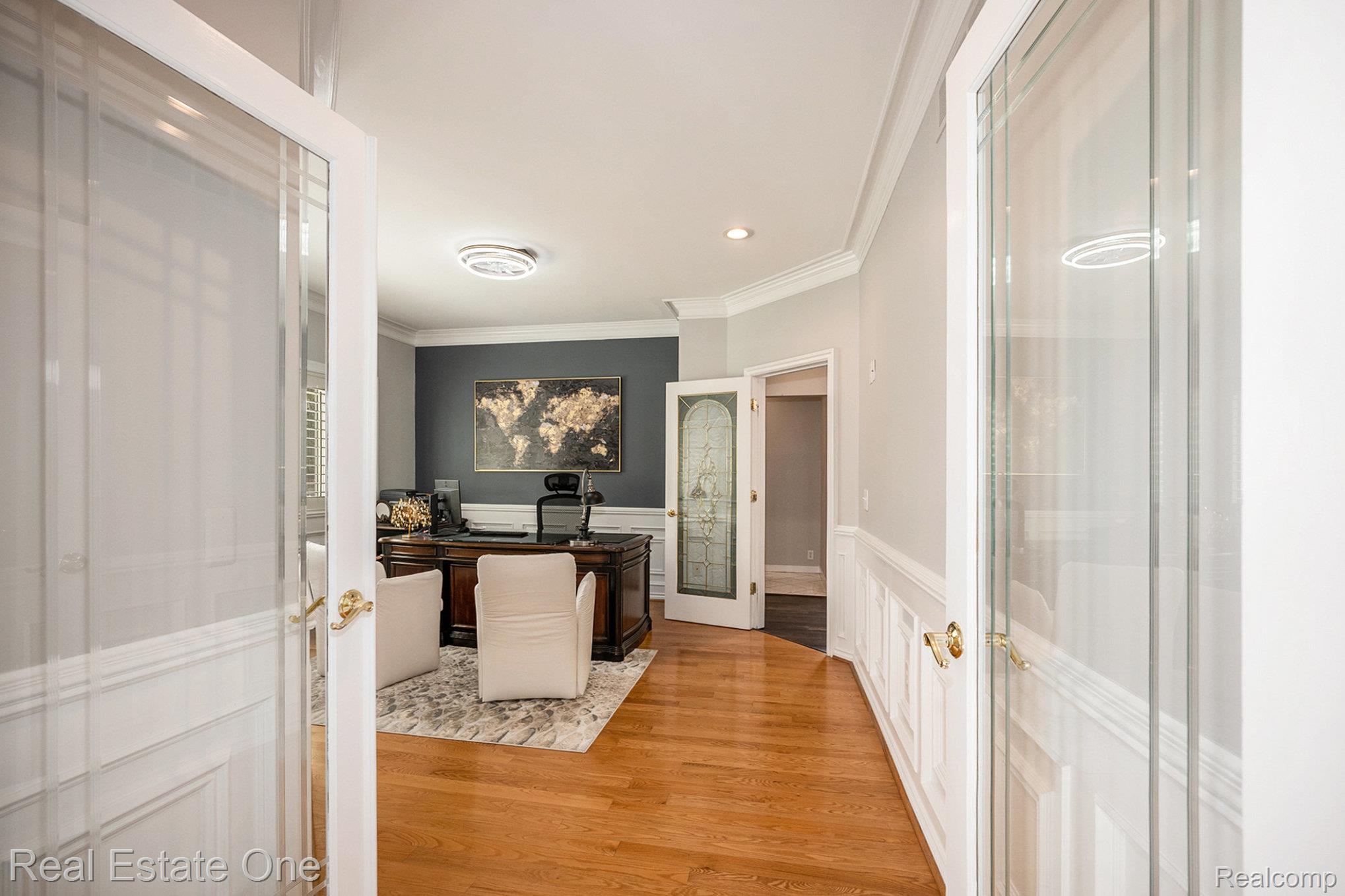 5772 North Rochester Road Rochester, MI 48306 - Photo 13 of 50 Corridor with french doors, ornamental molding, light wood-type flooring, a wainscoted wall, and recessed lighting
