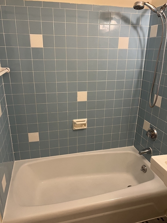 39 Linden Street, Unit 21 Boston, MA 02134 - Photo 6 of 20 a bathroom with a bathtub
