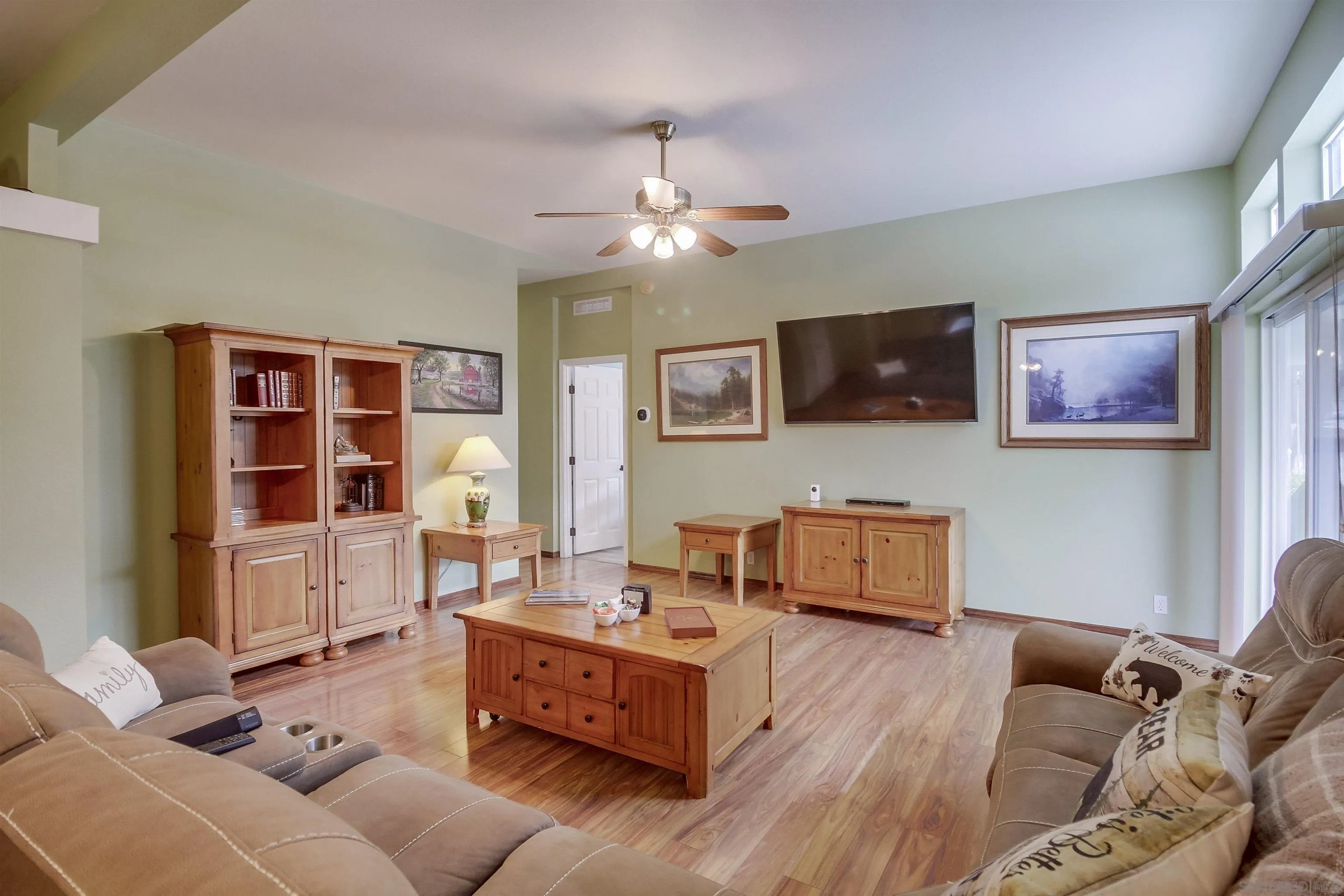 15935 Spring Oaks Road El Cajon, CA 92021 - Photo 13 of 66 a living room with furniture and a flat screen tv