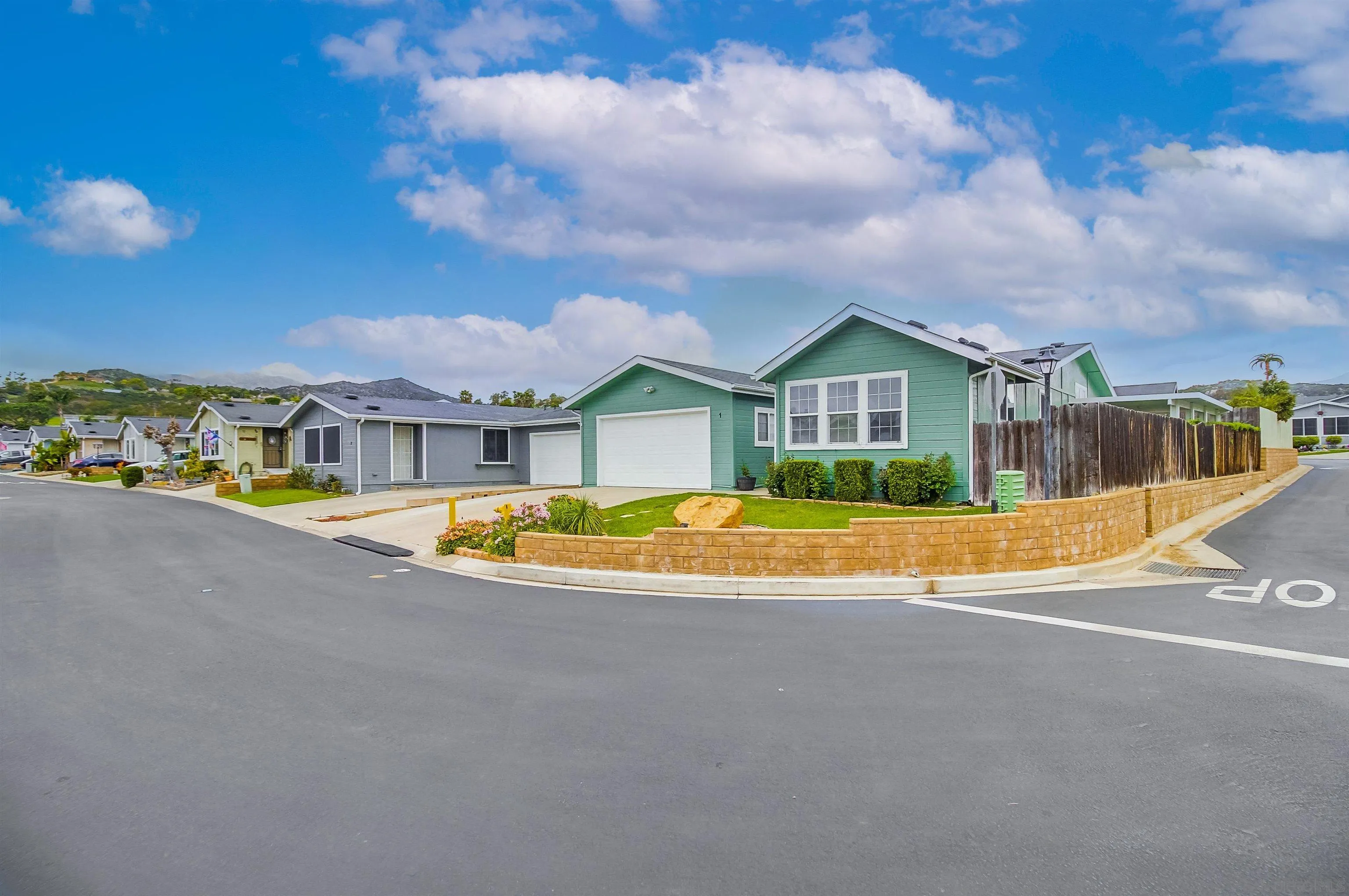 15935 Spring Oaks Road El Cajon, CA 92021 - Photo 2 of 66 a view of house with a large windows and a big yard