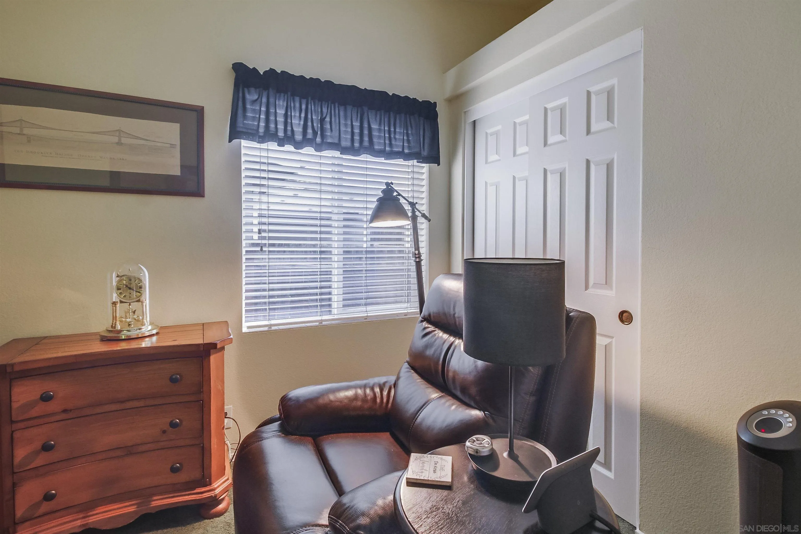 15935 Spring Oaks Road El Cajon, CA 92021 - Photo 40 of 66 a living room with furniture and a window