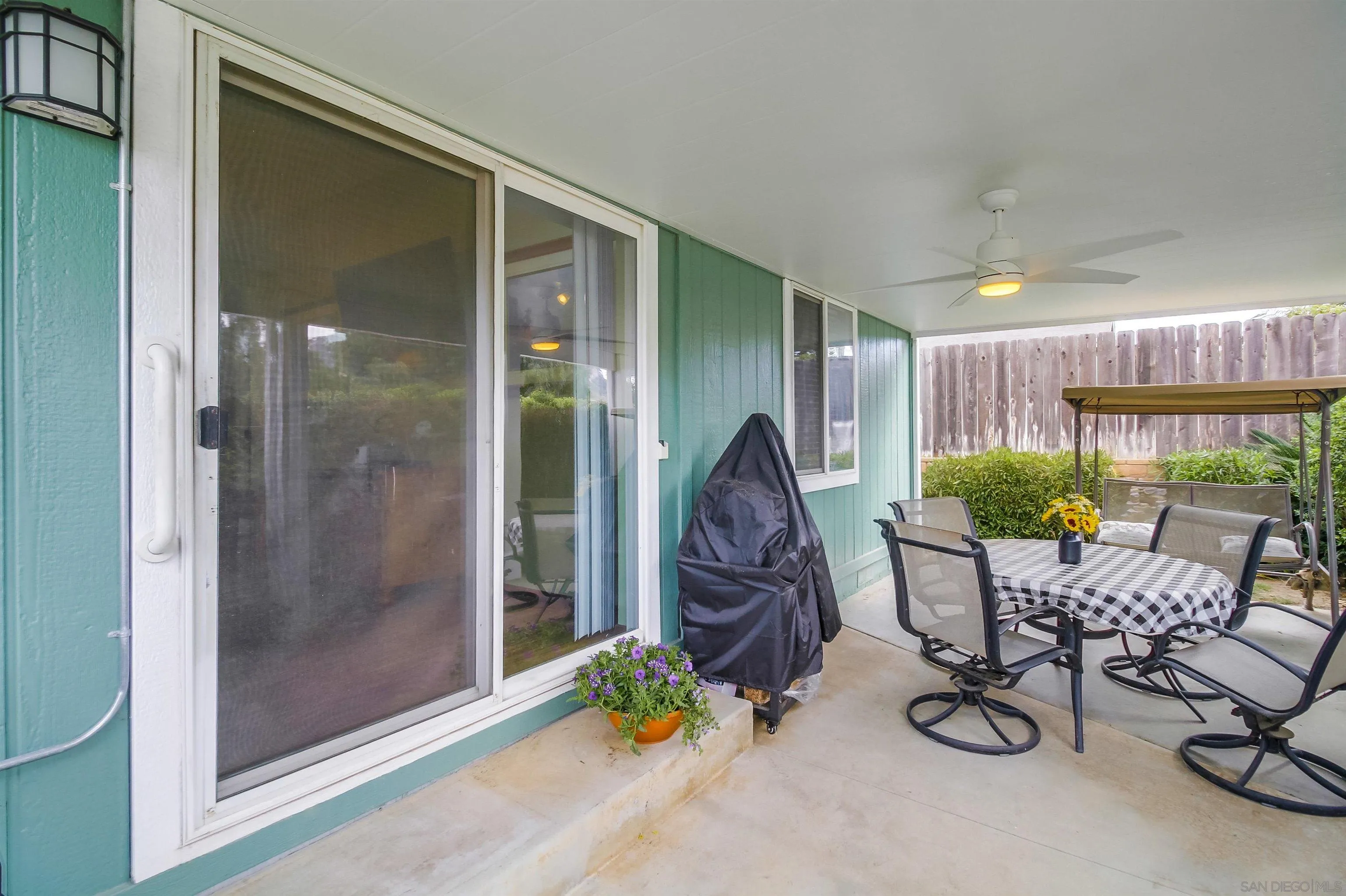 15935 Spring Oaks Road El Cajon, CA 92021 - Photo 47 of 66 a room with gym equipment and floor to ceiling window