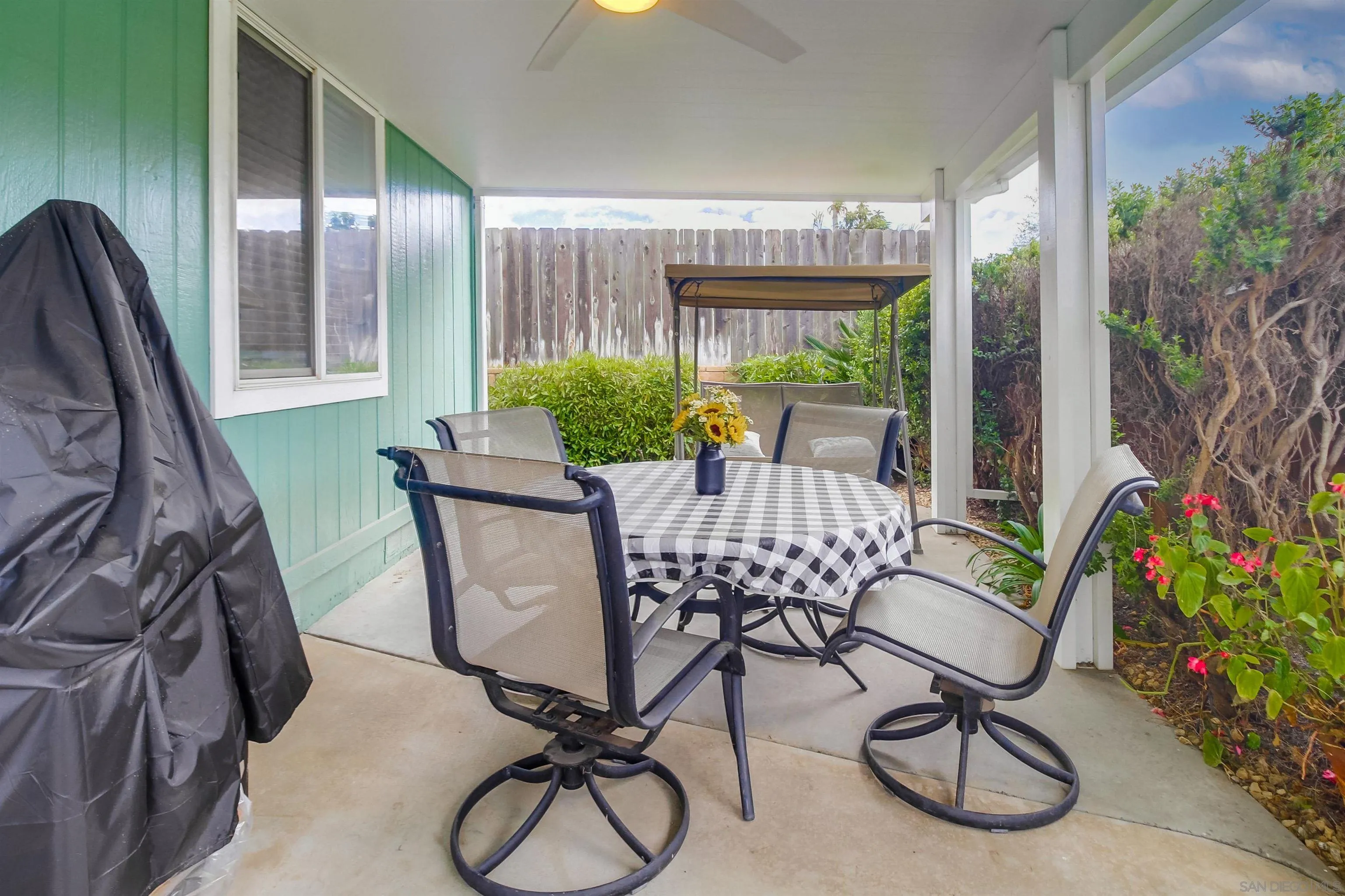 15935 Spring Oaks Road El Cajon, CA 92021 - Photo 48 of 66 a view of a dining room with furniture window and outside view