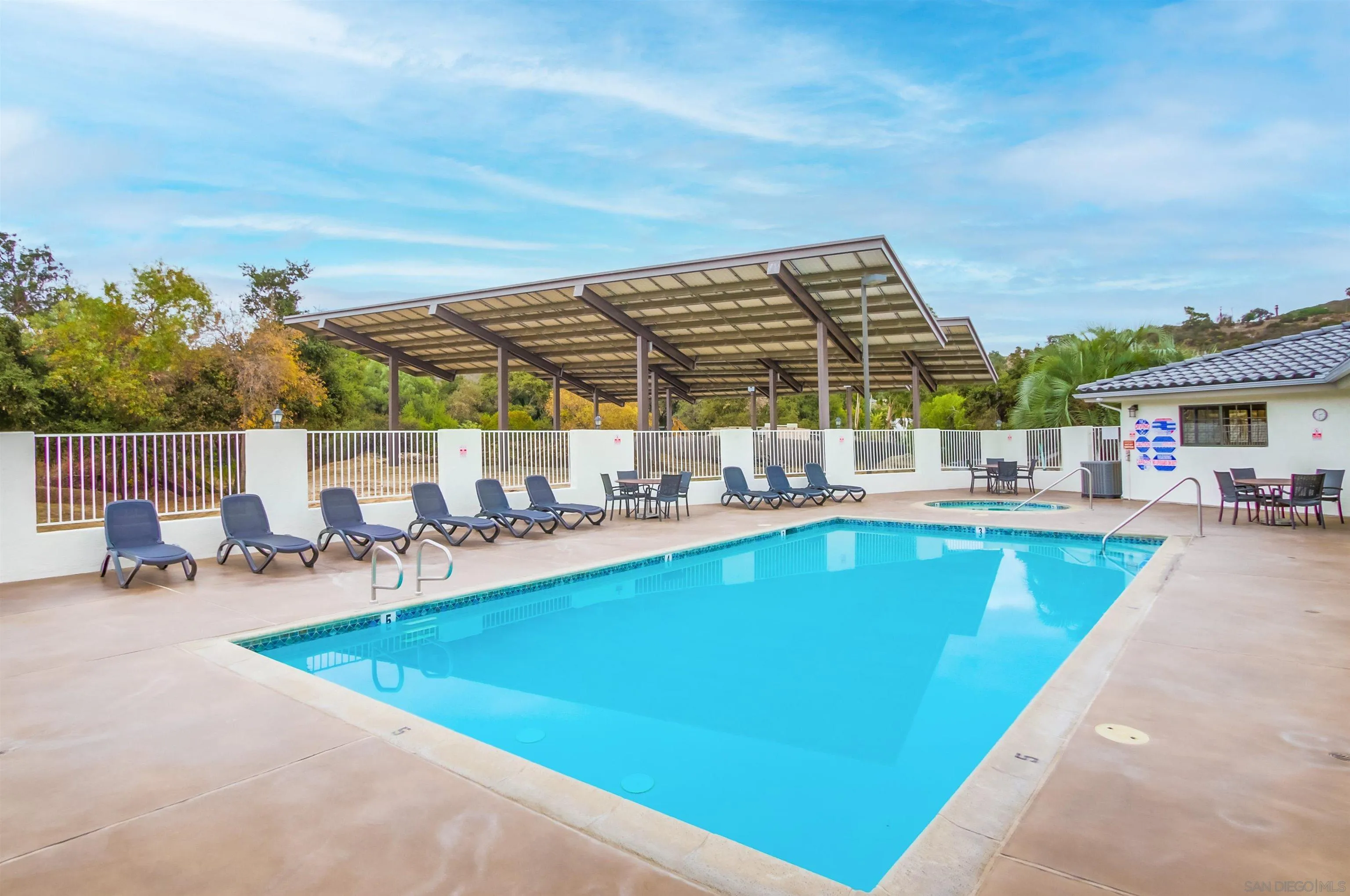 15935 Spring Oaks Road El Cajon, CA 92021 - Photo 63 of 66 a view of swimming pool with outdoor seating and plants