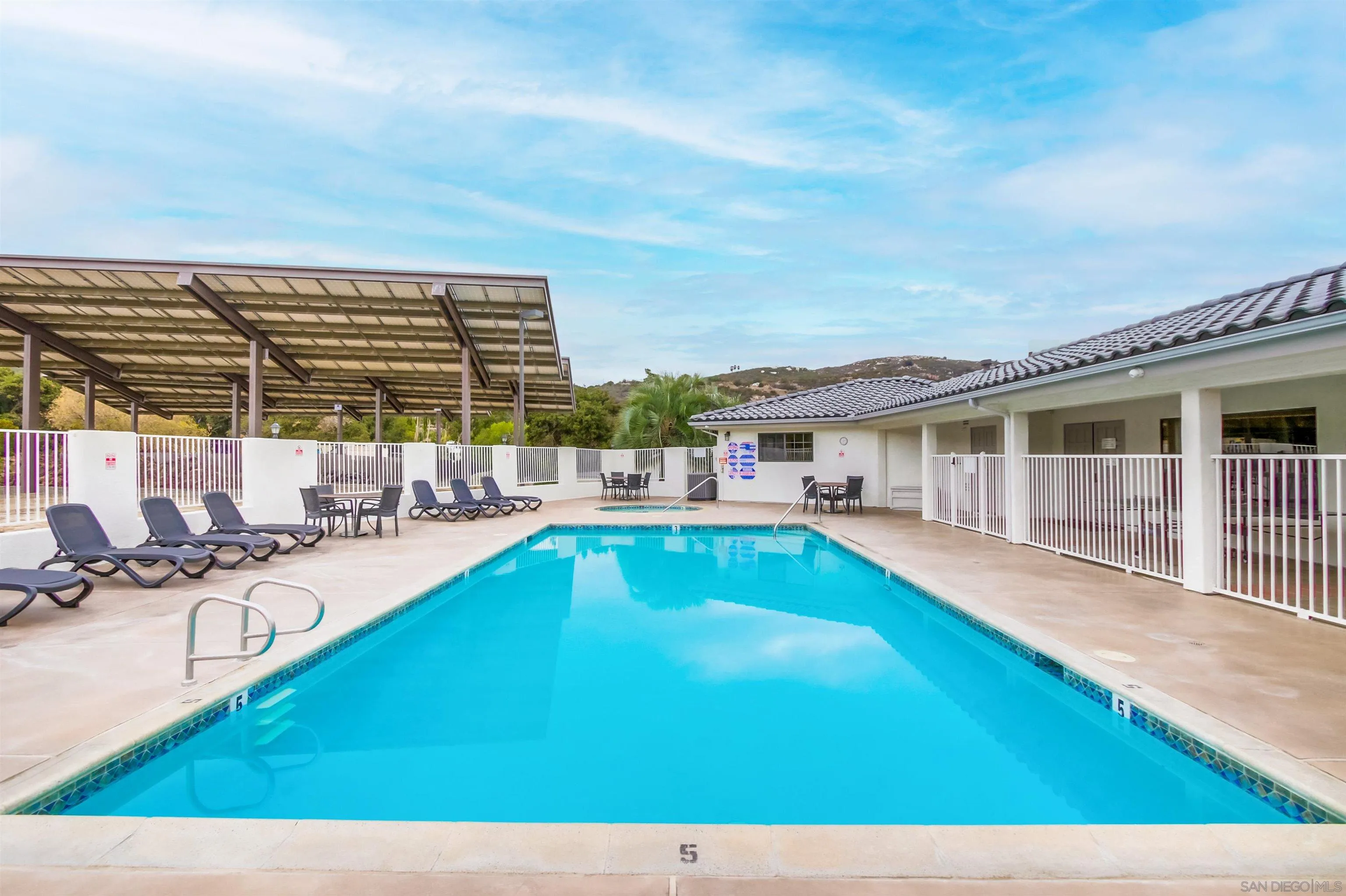15935 Spring Oaks Road El Cajon, CA 92021 - Photo 64 of 66 a view of a house with swimming pool and sitting area