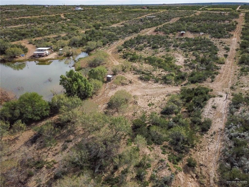 19 Vista Falcon Pvt Road Roma, TX 78584 - Photo 13 of 28 an aerial view of residential houses with outdoor space and trees