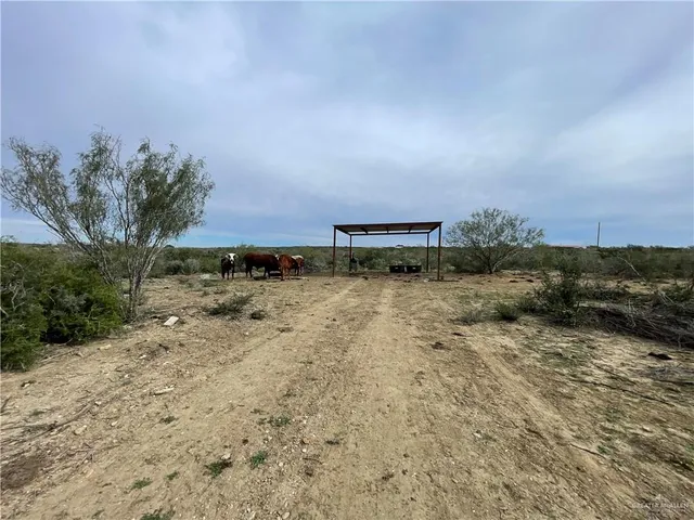 a view of a lake with a building in the background