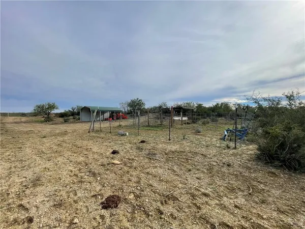 an aerial view of residential house with parking space