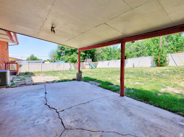 1272 Cook Street Ogden, UT 84404 - Photo 6 of 58 Covered patio space featuring a concrete slab and exposed support beams