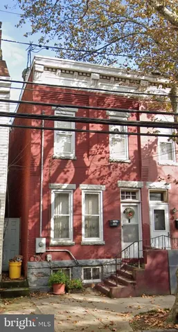 a front view of a building with street