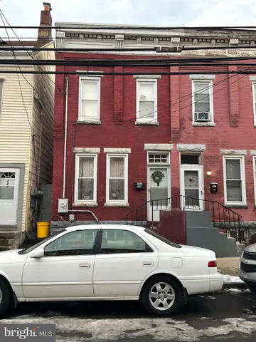 a car parked in front of a building