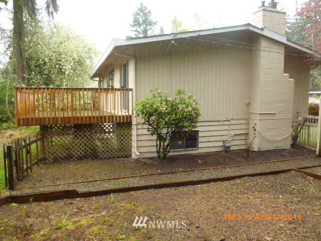 101 234th Place Southeast Bothell, WA 98021 - Photo 2 of 23 a view of a house with a yard and potted plants