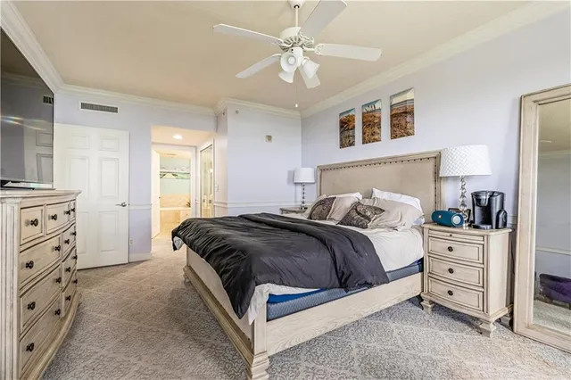 a bedroom with bed and window