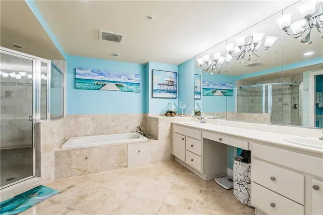 a bathroom with a tub sink and view