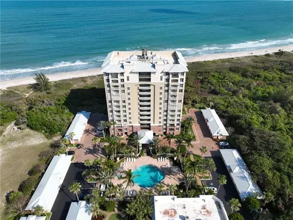 a view of a balcony with chairs