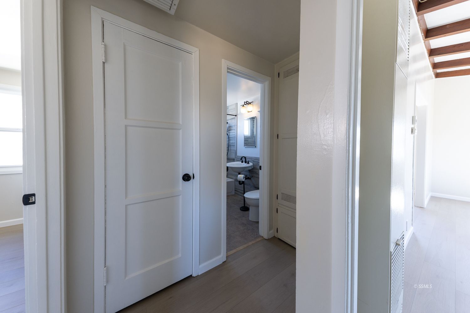 424 North Norma Street Ridgecrest, CA 93555 - Photo 10 of 27 a view of a bathroom from a hallway