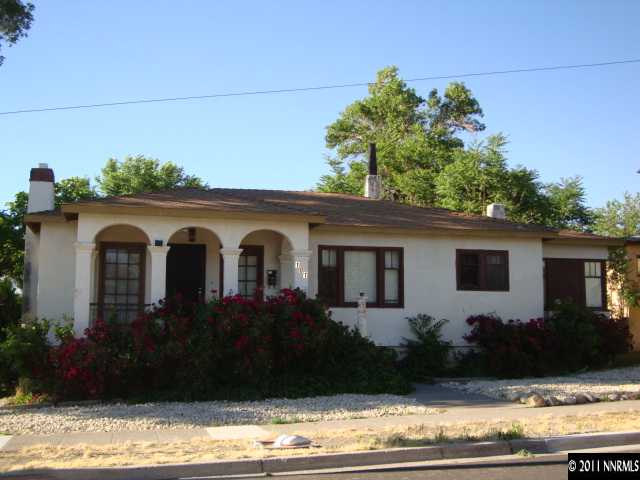 107 Burns Street Reno, NV 89502 - Photo 1 of 13 a front view of a house with garden
