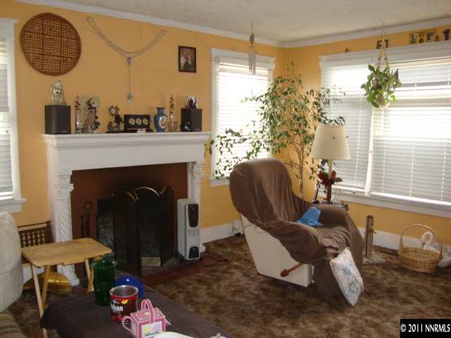 107 Burns Street Reno, NV 89502 - Photo 11 of 13 a living room with furniture and a fireplace