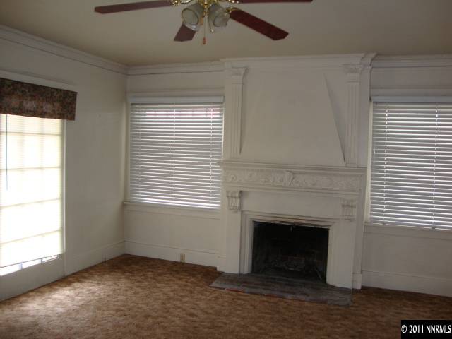 107 Burns Street Reno, NV 89502 - Photo 2 of 13 an empty room with windows