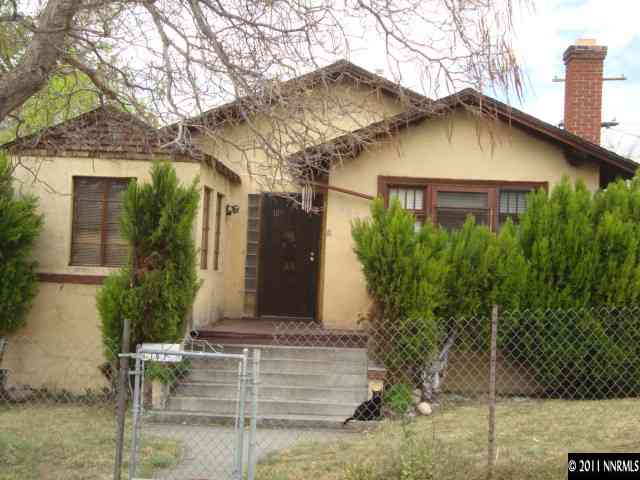 107 Burns Street Reno, NV 89502 - Photo 8 of 13 a front view of a house with garden