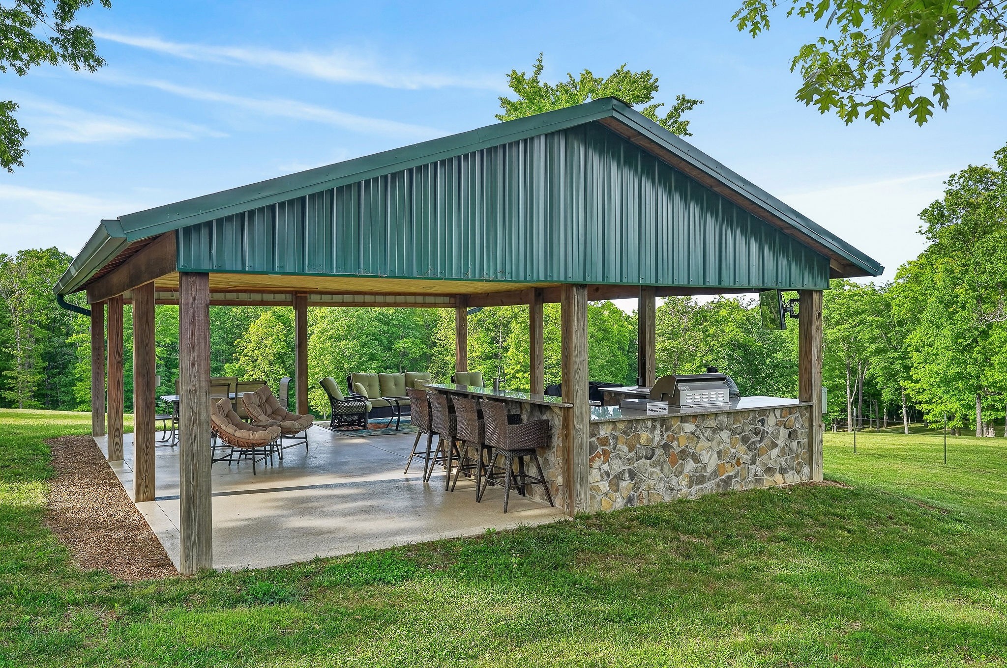933 John Henry Lewis Road Dunlap, TN 37327 - Photo 82 of 100 a patio with a table and chairs