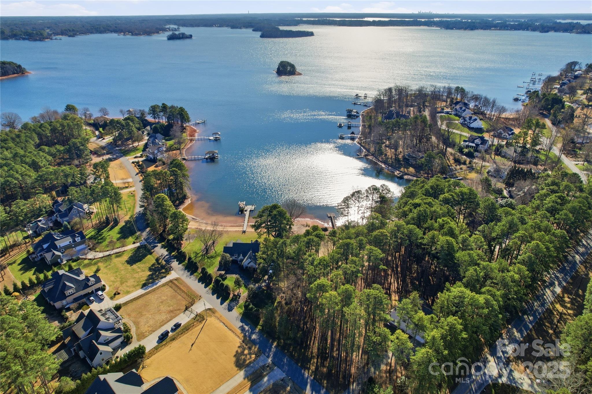 2563 Brawley School Road Mooresville, NC 28117 - Photo 13 of 27 a view of a houses with a lake