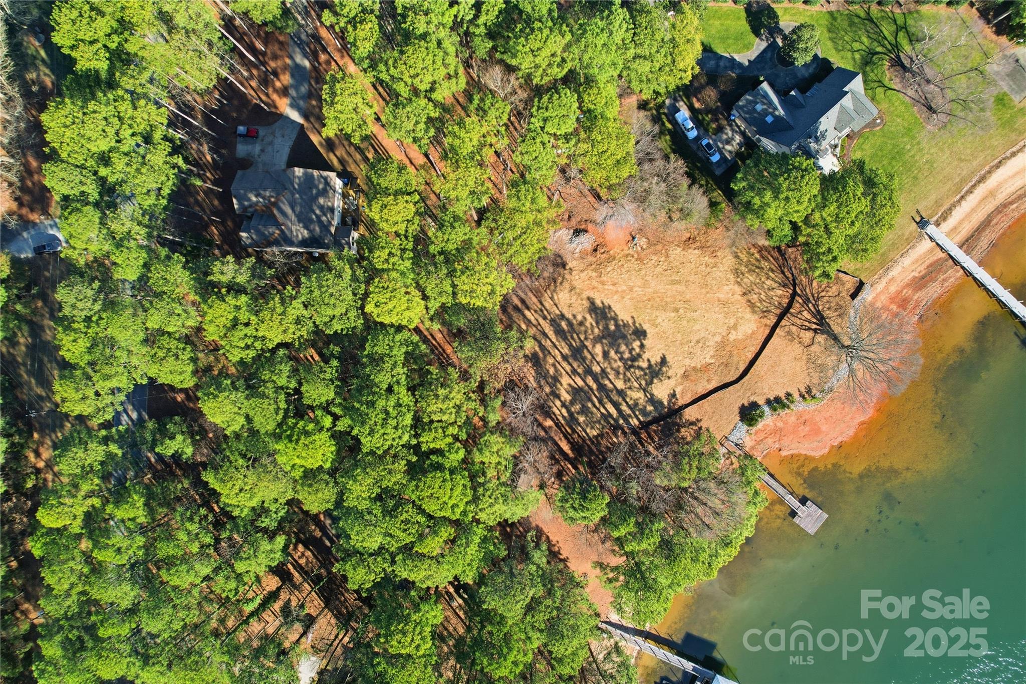 2563 Brawley School Road Mooresville, NC 28117 - Photo 16 of 27 a backyard of a house with lots of green space