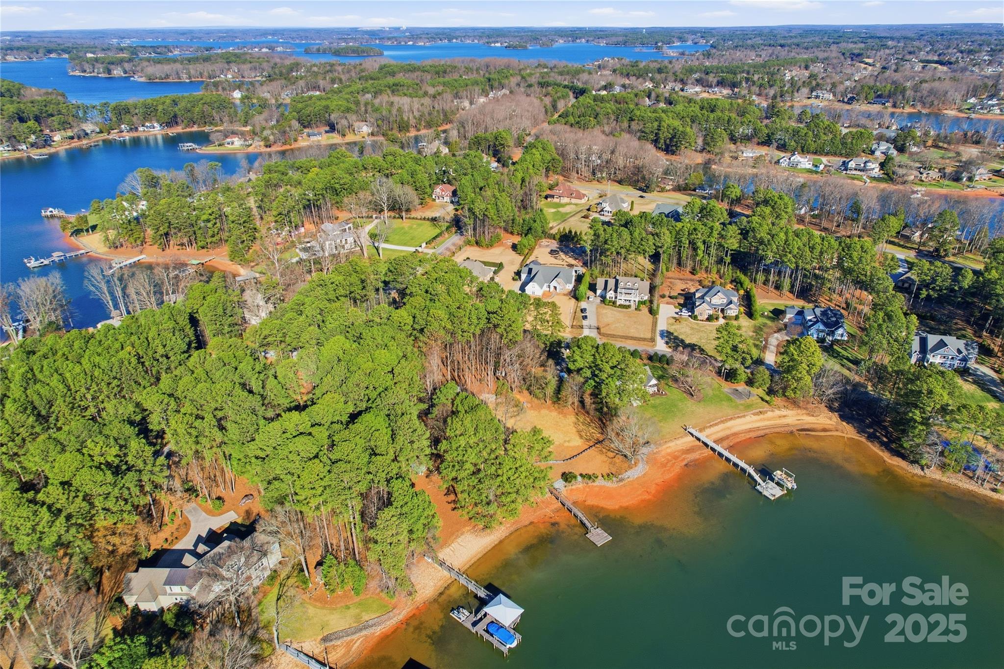 2563 Brawley School Road Mooresville, NC 28117 - Photo 18 of 27 an aerial view of residential houses with outdoor space and trees