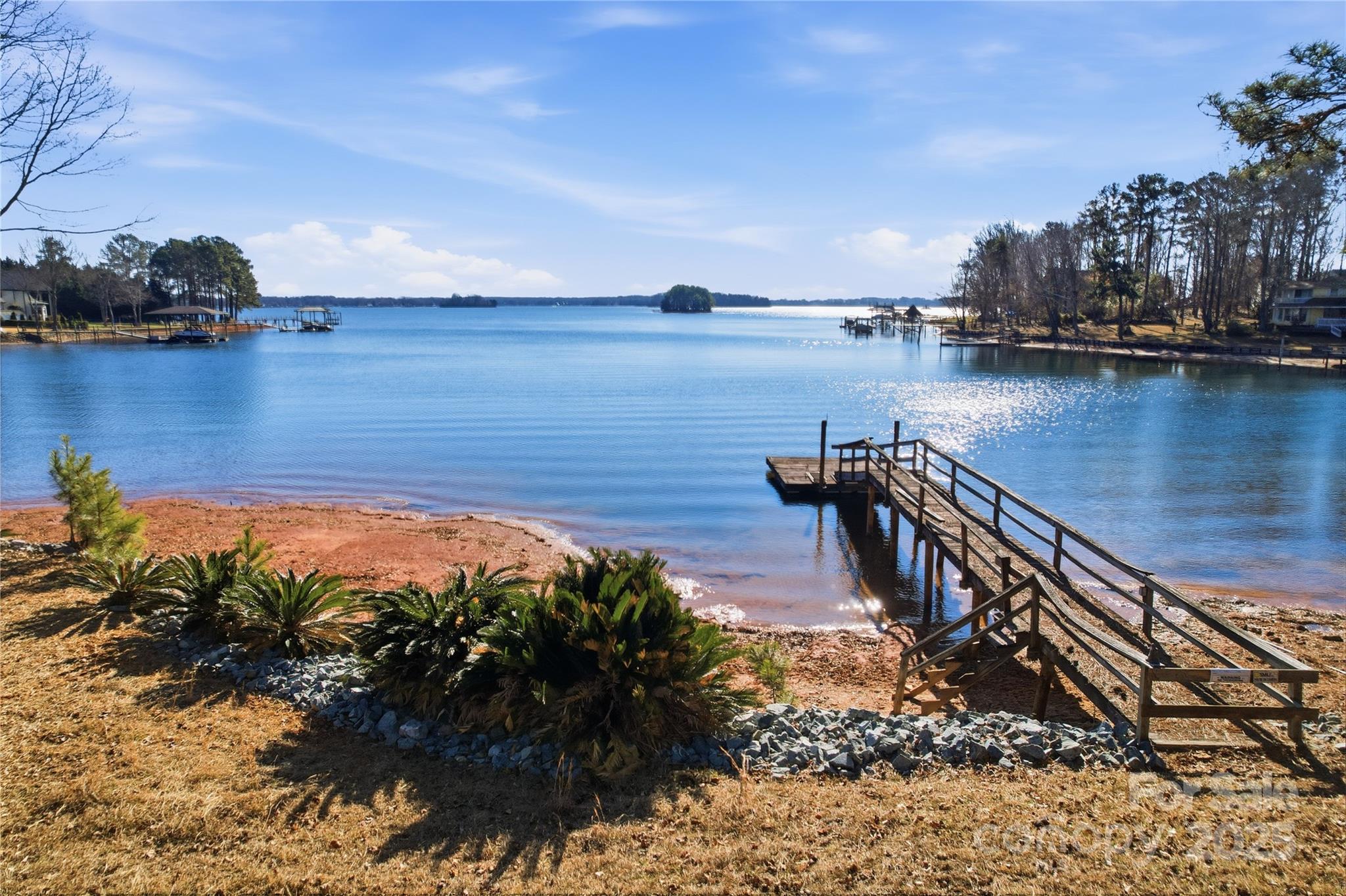 2563 Brawley School Road Mooresville, NC 28117 - Photo 3 of 27 a view of a lake with outdoor space