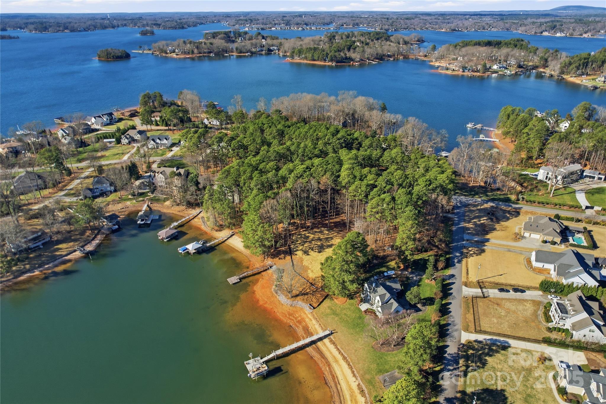 2563 Brawley School Road Mooresville, NC 28117 - Photo 10 of 27 an aerial view of lake residential houses with outdoor space and swimming pool