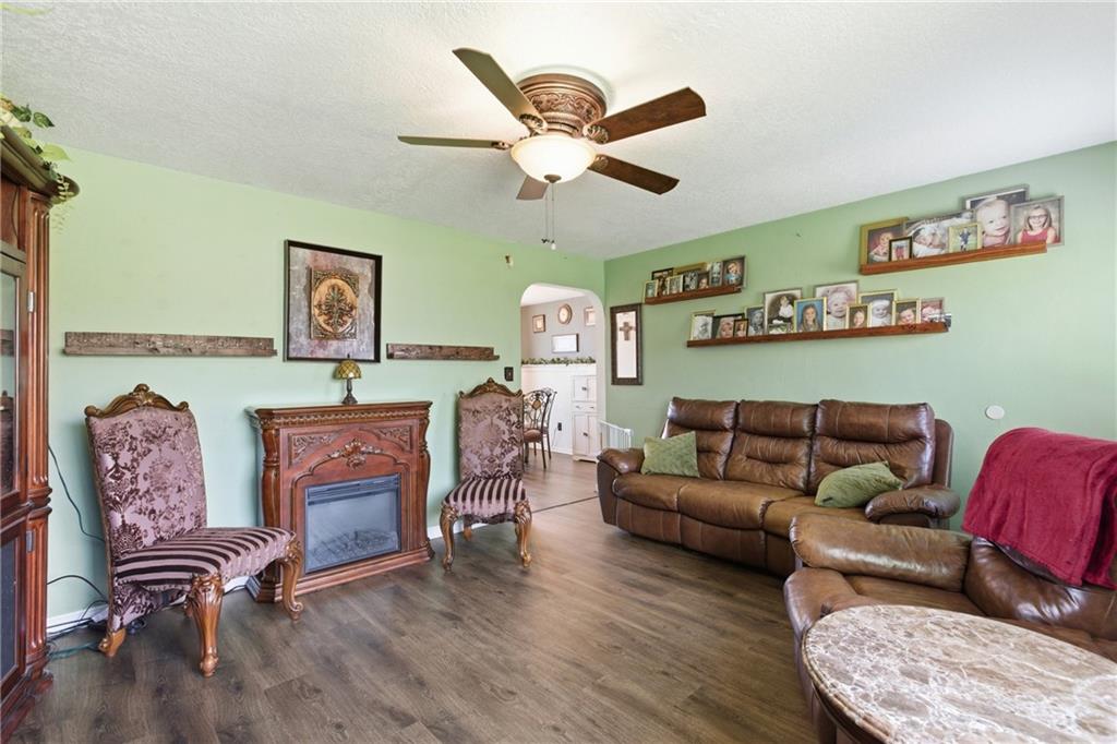 1630 Old Brodhead Road Monaca, PA 15061 - Photo 11 of 28 a living room with furniture a ceiling fan and a rug